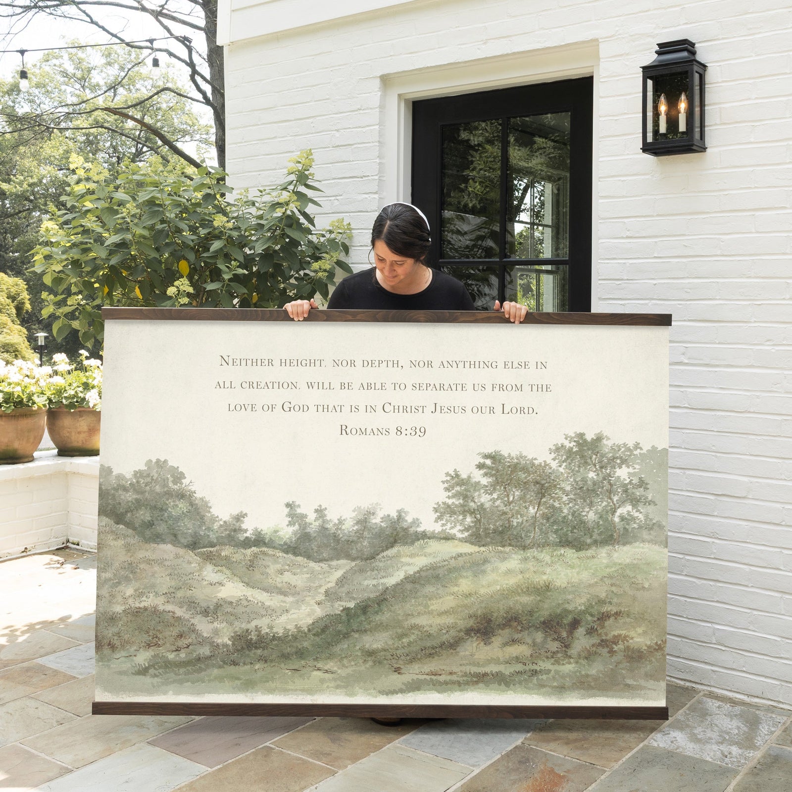 Cozy living room with a cream sofa and neutral decor, featuring Bible verse art with a serene watercolor tree landscape, perfect for Christian home inspiration.