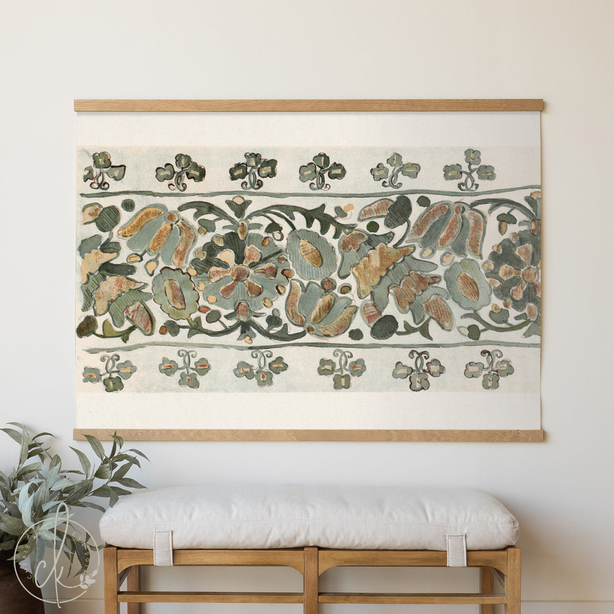 Decorative wall art with floral pattern above a wooden bench.