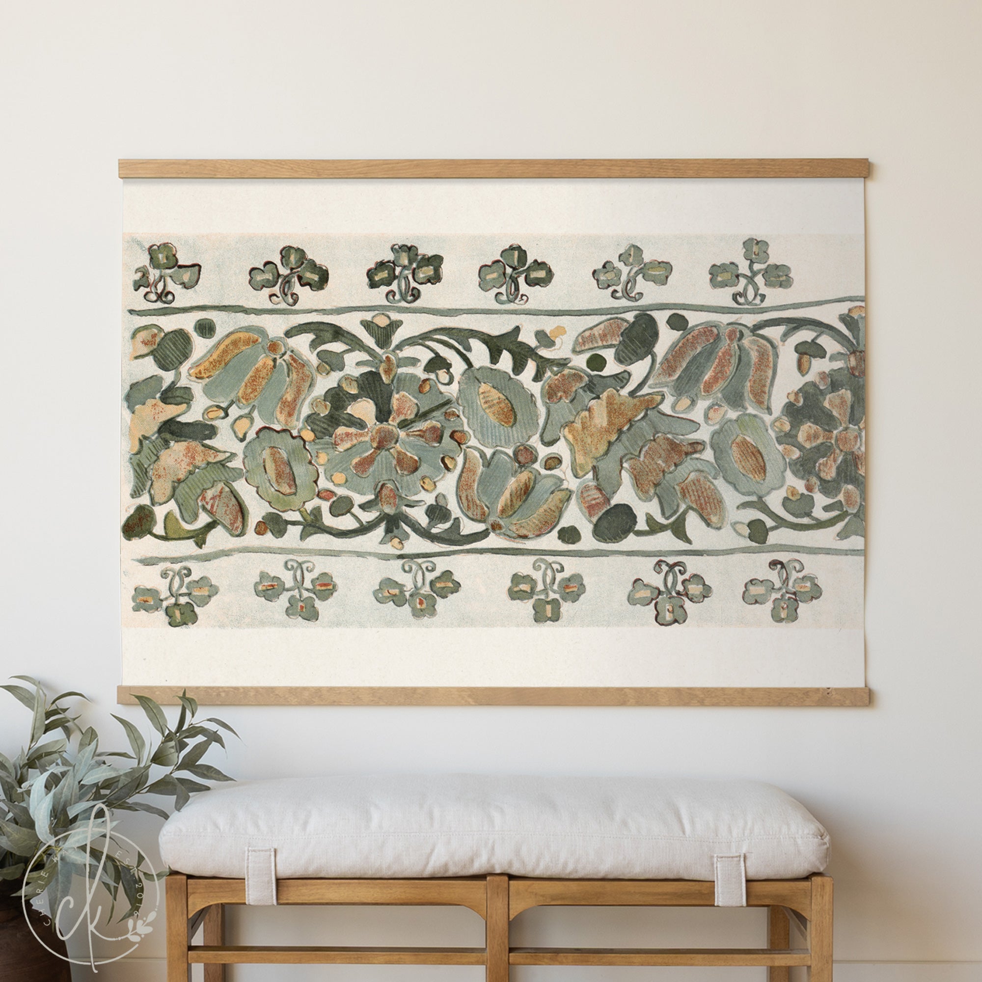 Decorative wall art with floral pattern above a wooden bench.