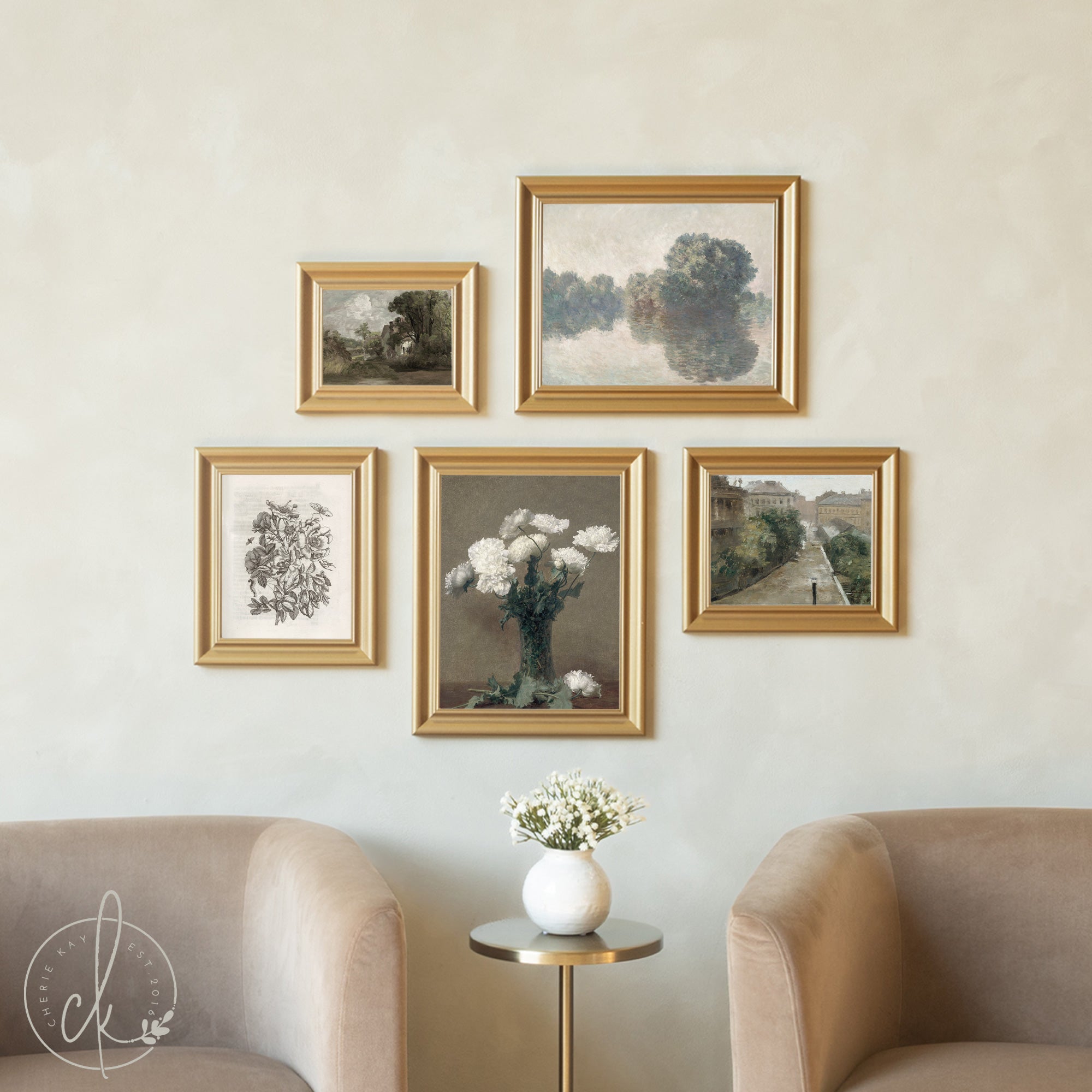Wall with framed artworks and a vase of flowers on a small table, with beige chairs.
