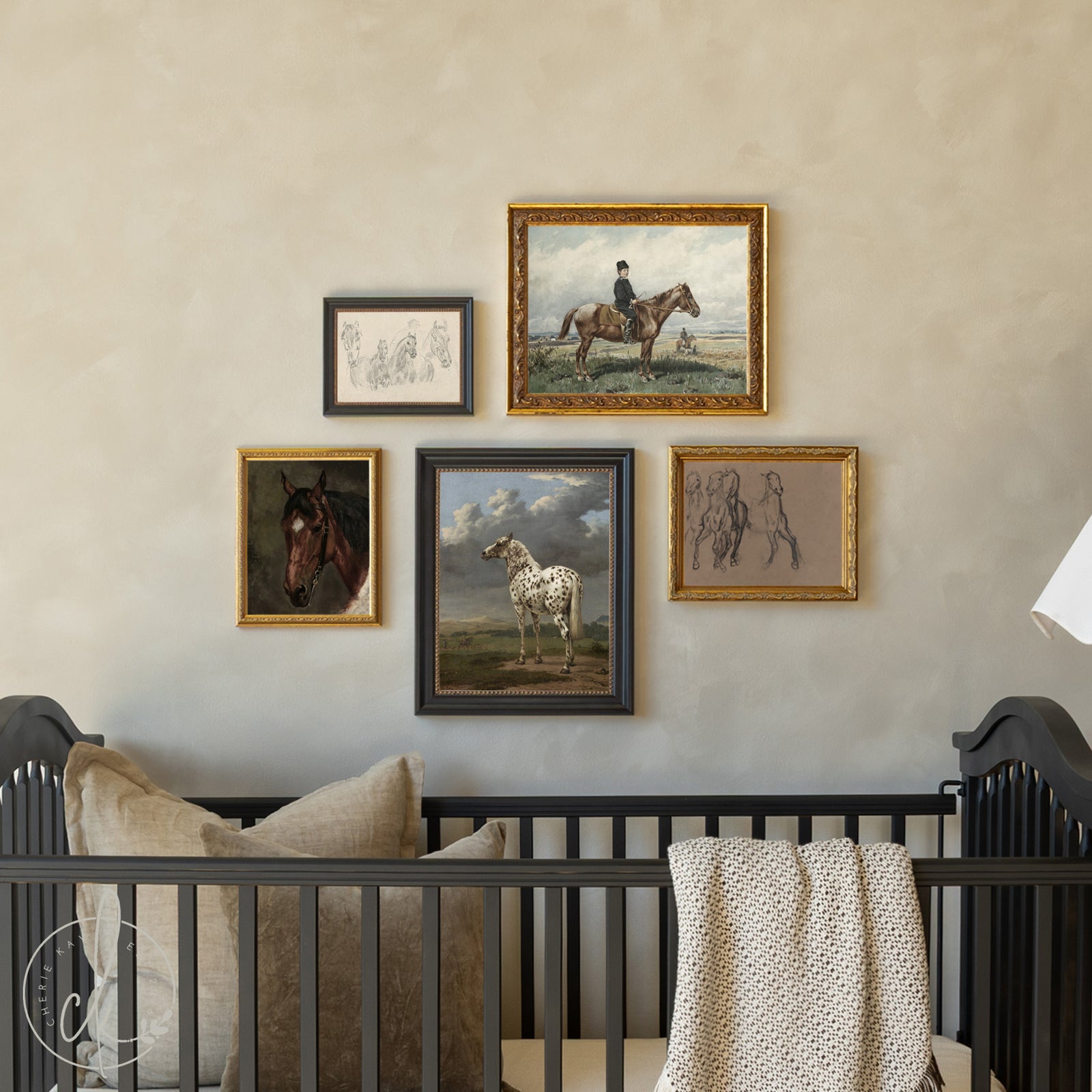 Nursery with black crib and wall art featuring horses and riders.