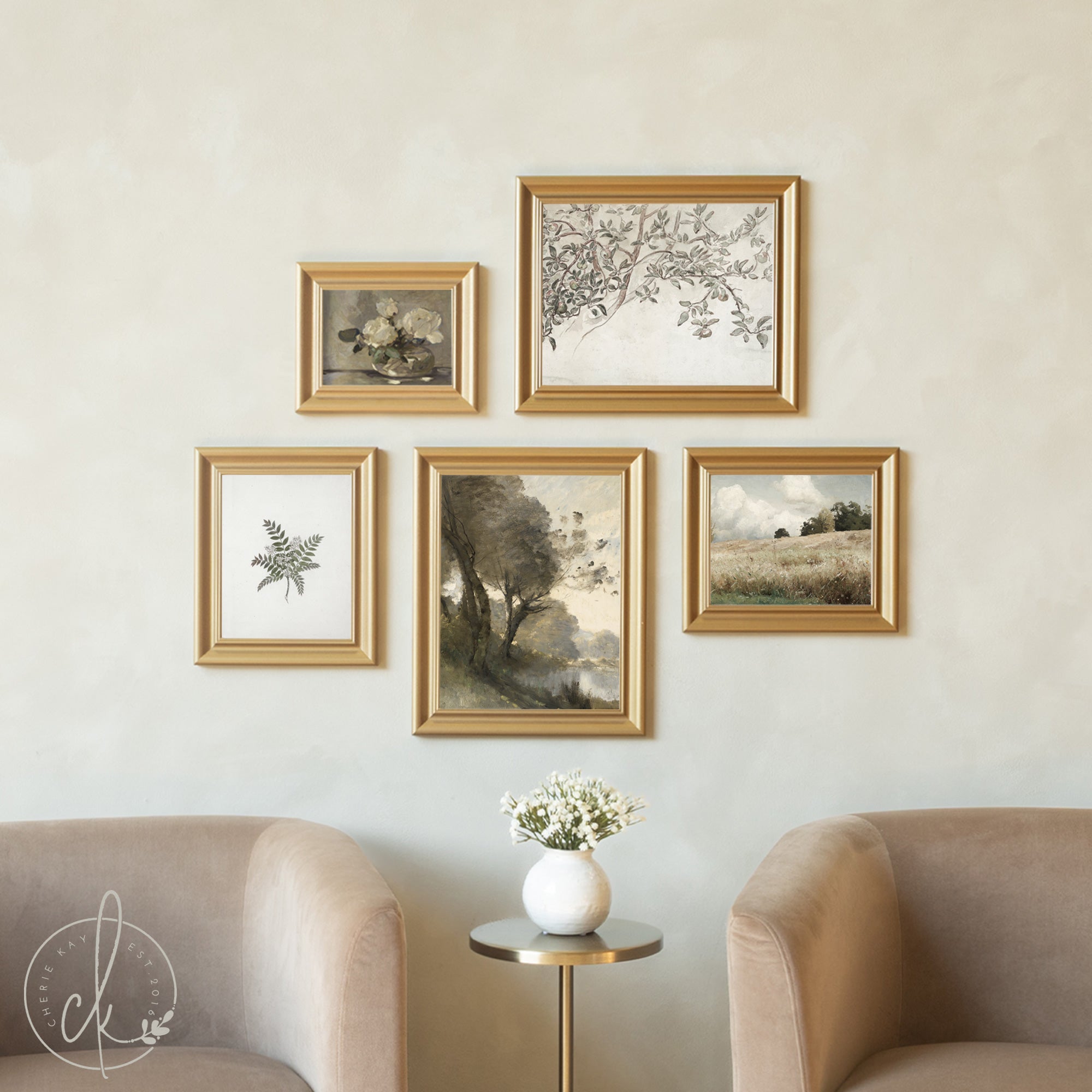 Set of framed artworks on a wall with a vase of flowers on a small table.