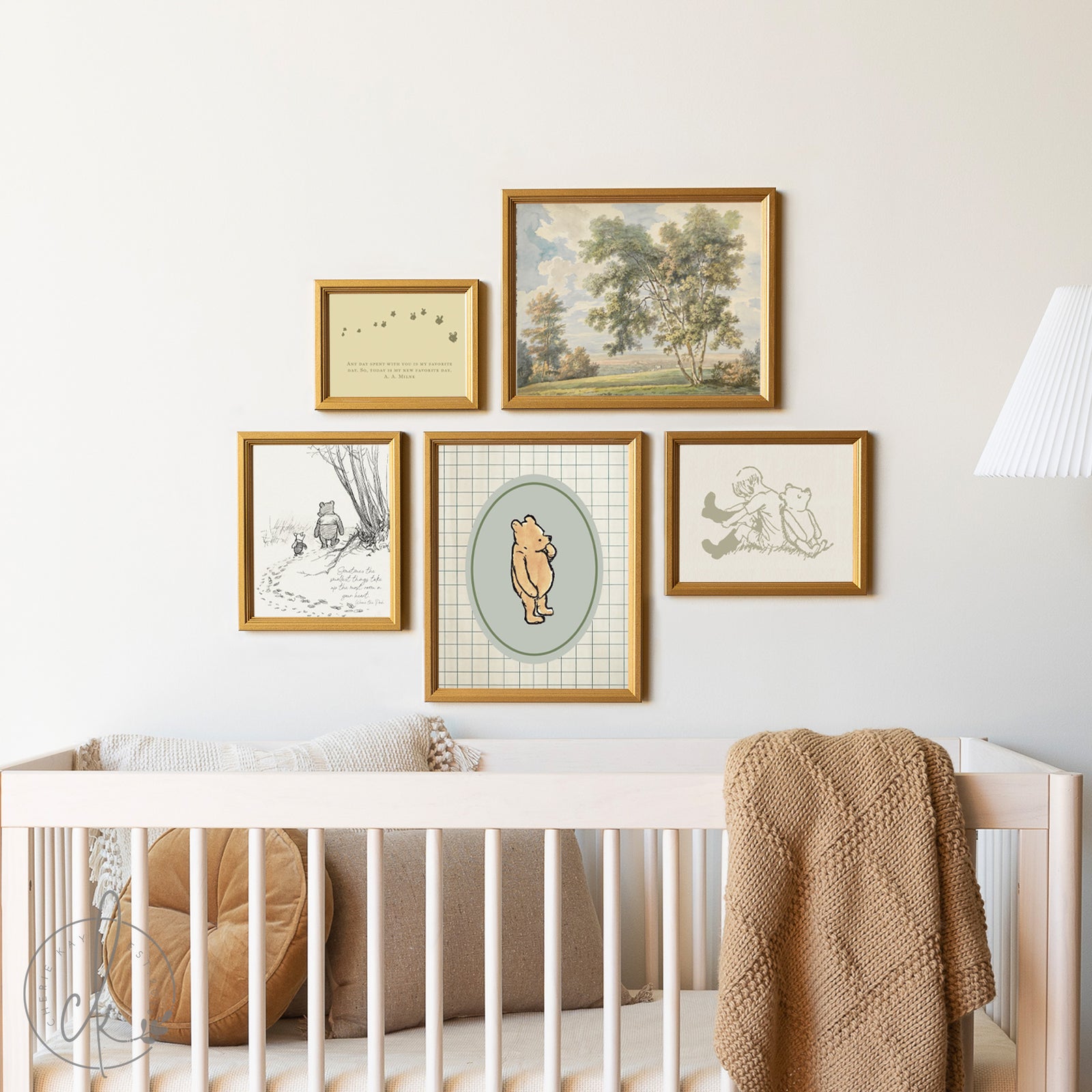 Nursery room with framed artwork on the wall above a crib.