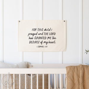 Christian nursery decor canvas flag with 1 Samuel 1:27 verse in hand-lettered text on cream canvas