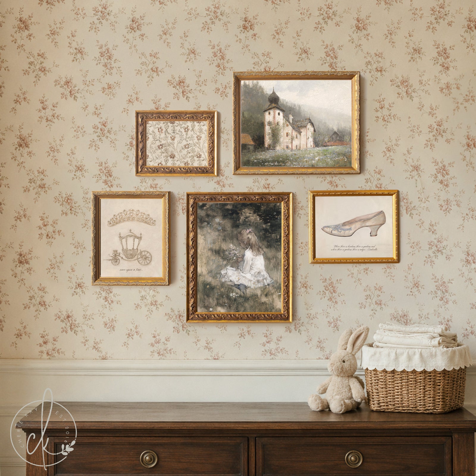 Vintage fairytale nursery princess decor with gold frames and Cinderella artwork.
