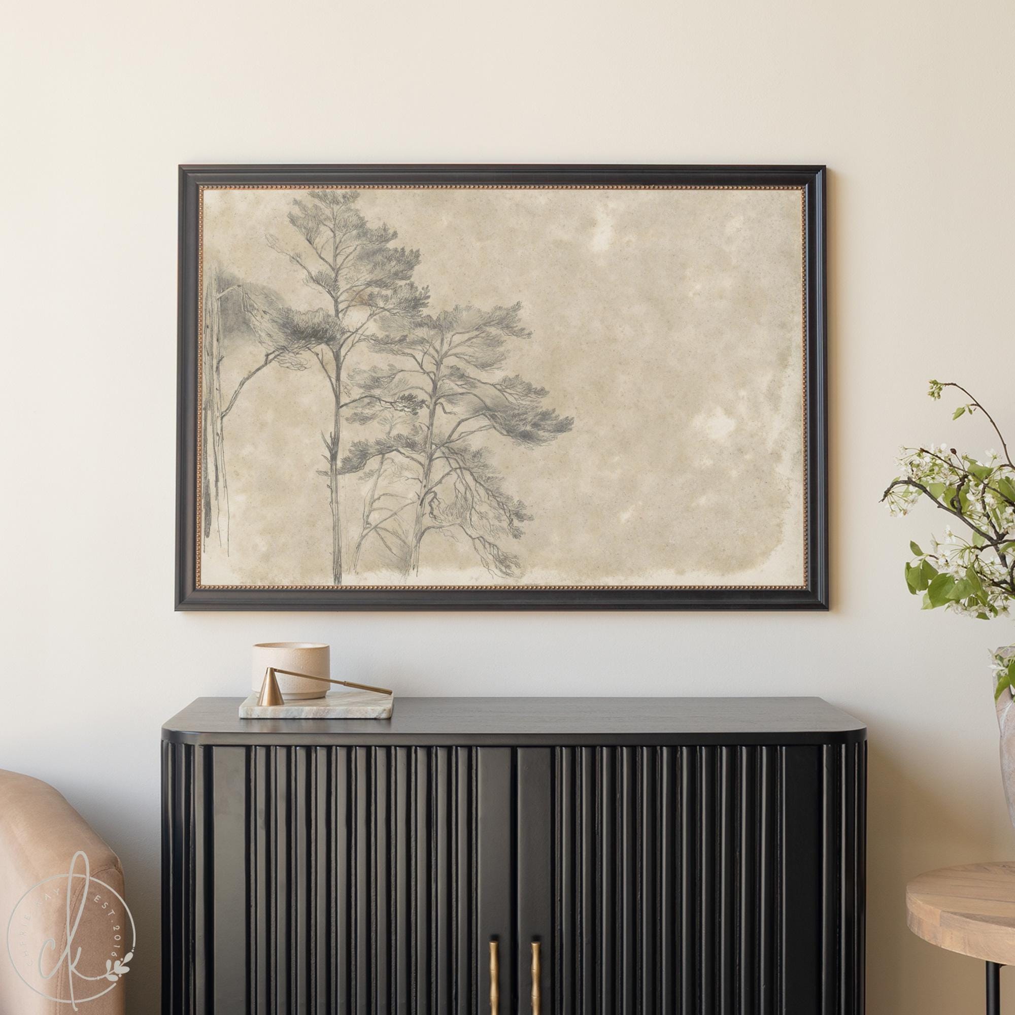 Antique gold framed large tree painting featuring a vintage pine sketch on a neutral canvas, styled as large wall art above a black sideboard for elegant living-room decor.
