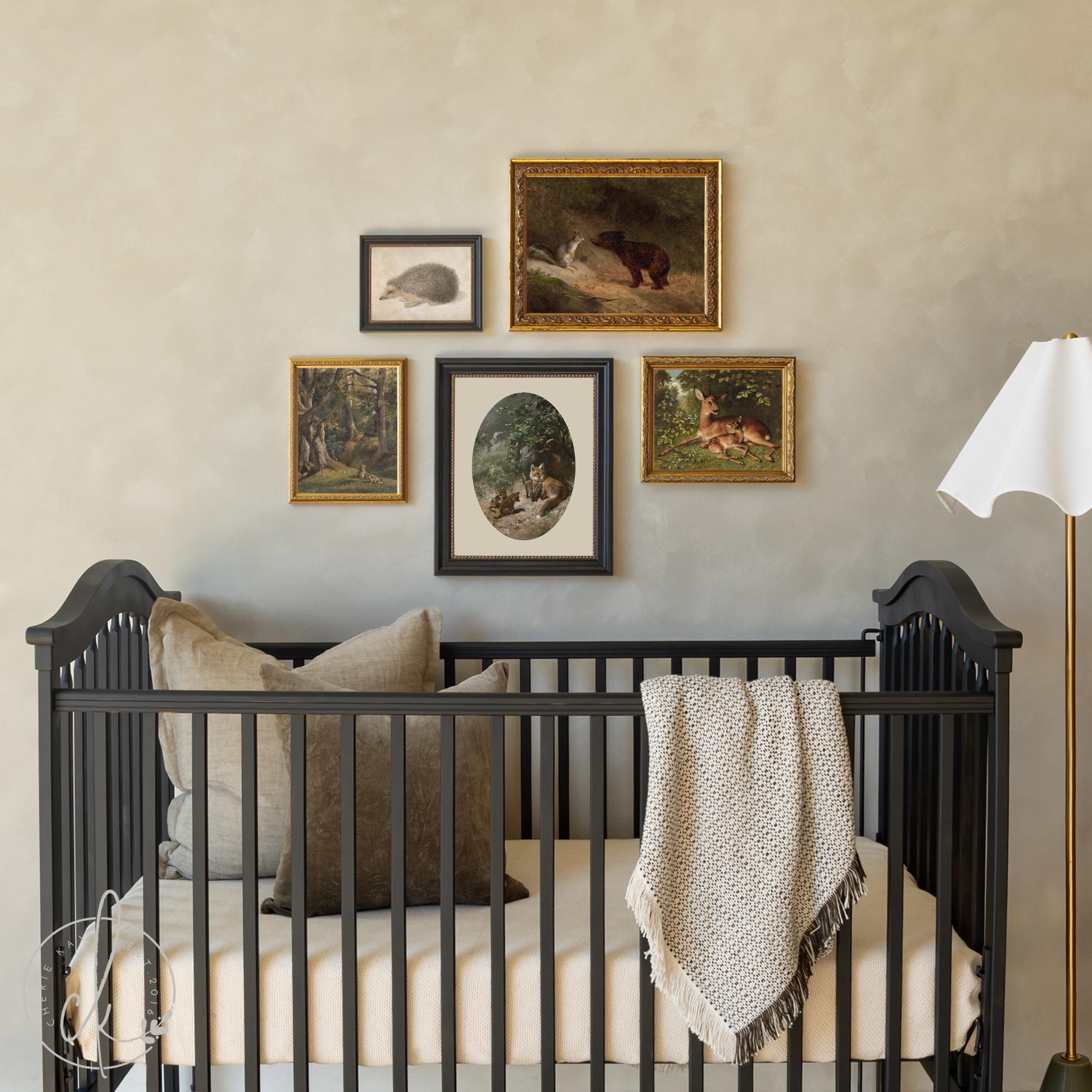 Woodland nursery wall art set of five vintage-style animal prints (fox, hedgehog, deer, squirrel, bear) in ornate gold and black frames.