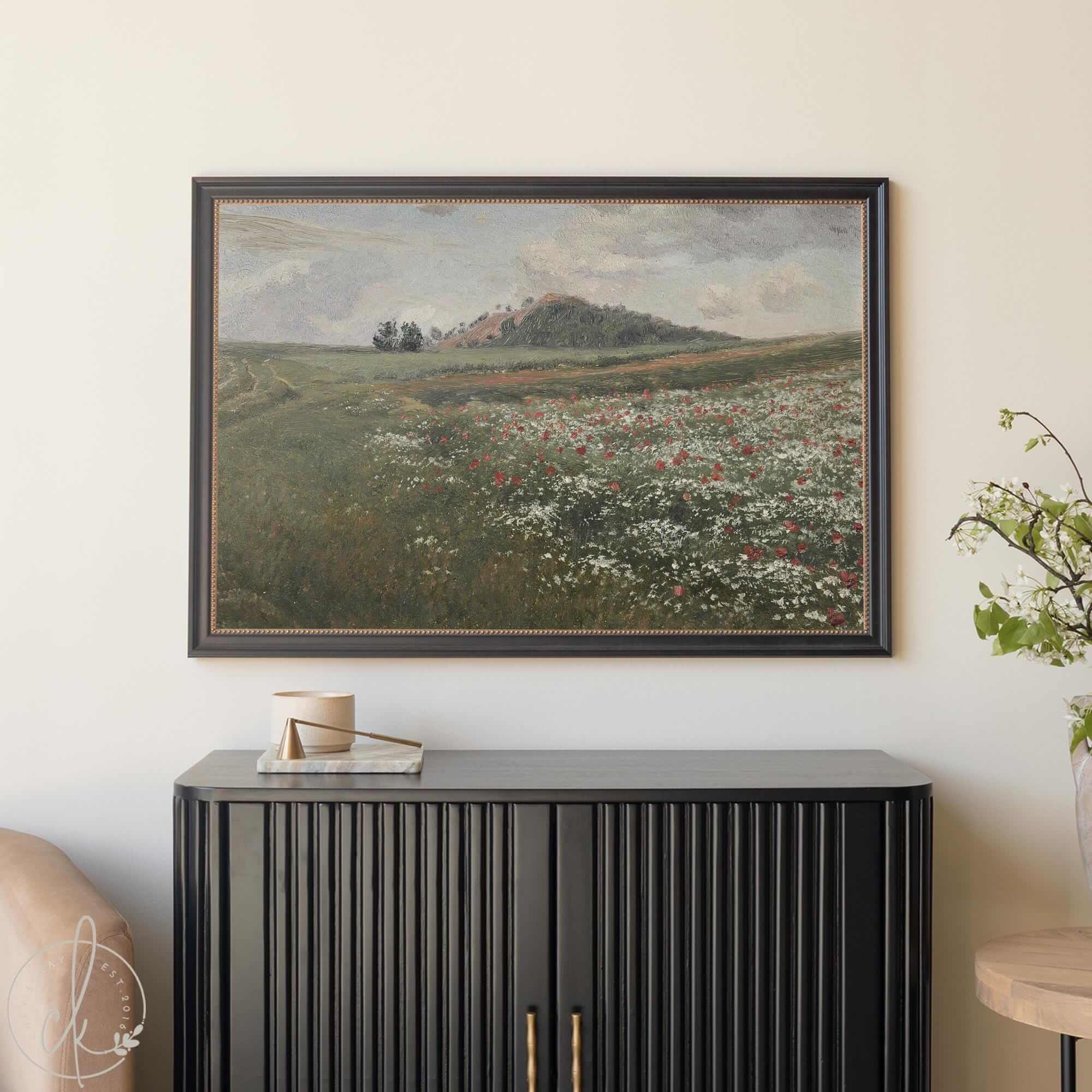 Framed canvas print of a vintage wildflower meadow painting with red and white blooms and rolling hills, rustic countryside wall decor for living rooms.