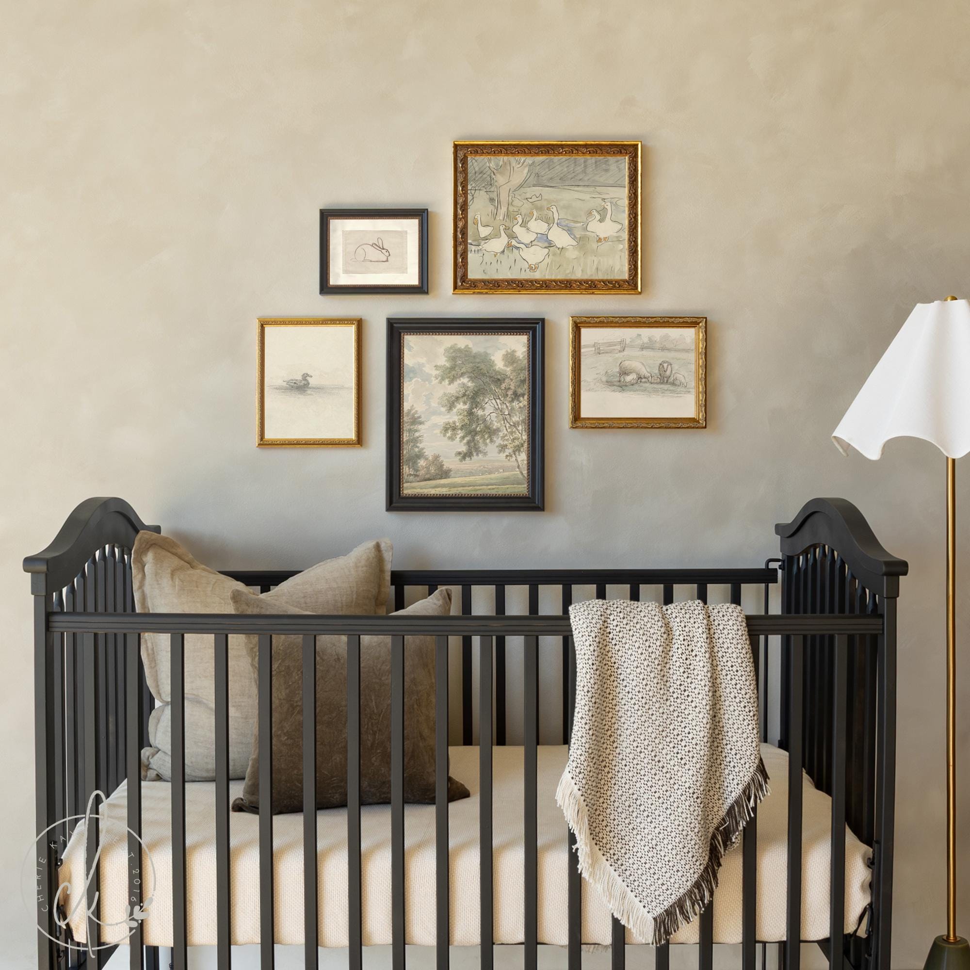 Animal nursery wall art featuring vintage style sketches of rabbits, sheep, and birds in ornate gold and black frames for gallery wall decor