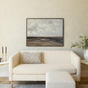 Framed coastal wall art featuring dramatic stormy seascape with gray clouds over ocean waters for living room decor