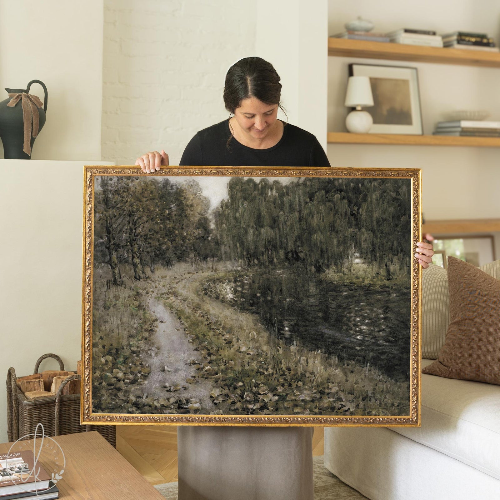 Framed landscape painting with river and trees in vintage gold frame wall art style.