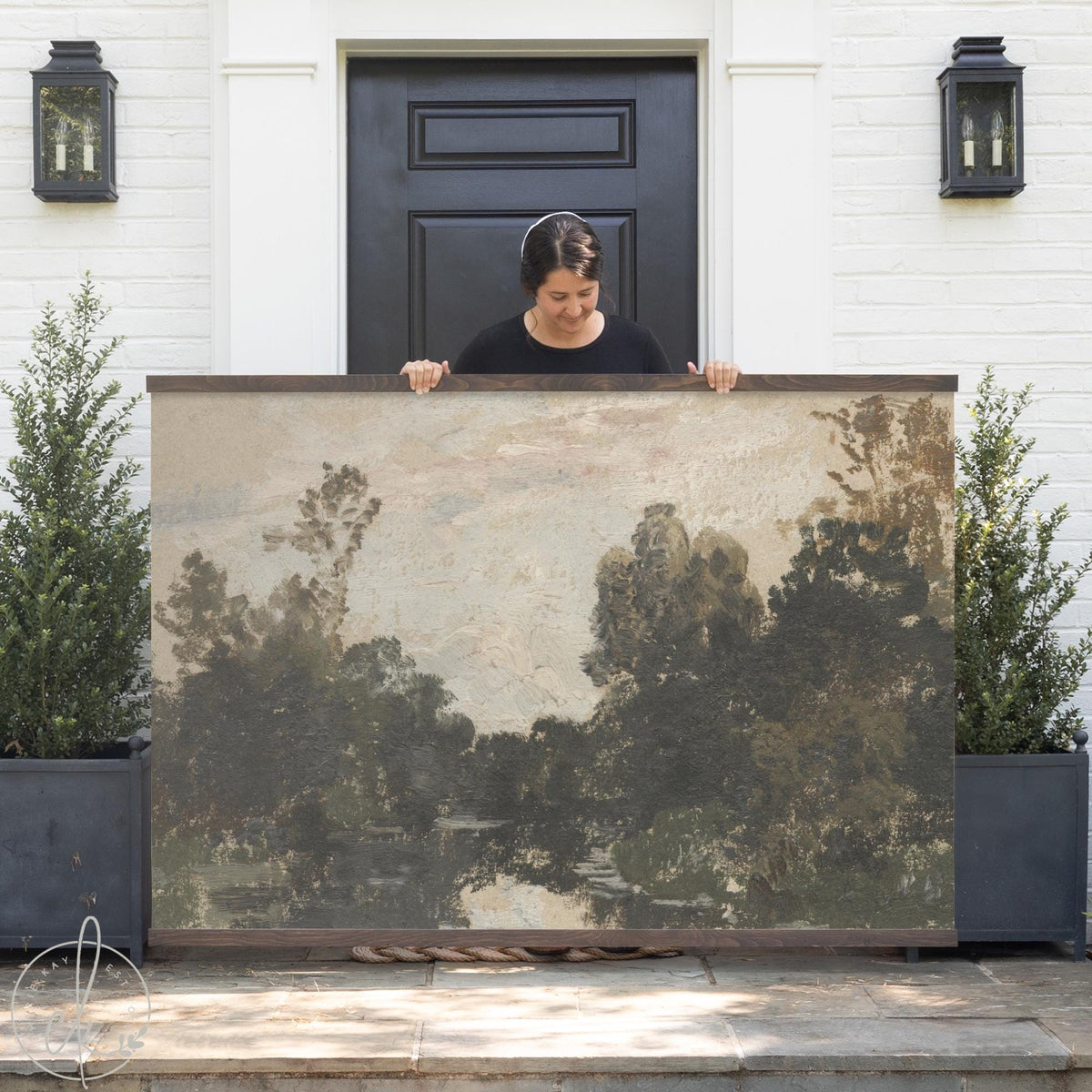 Impressionist landscape art canvas tapestry with moody river and tree scene in olive green and earth tones on wood frame.