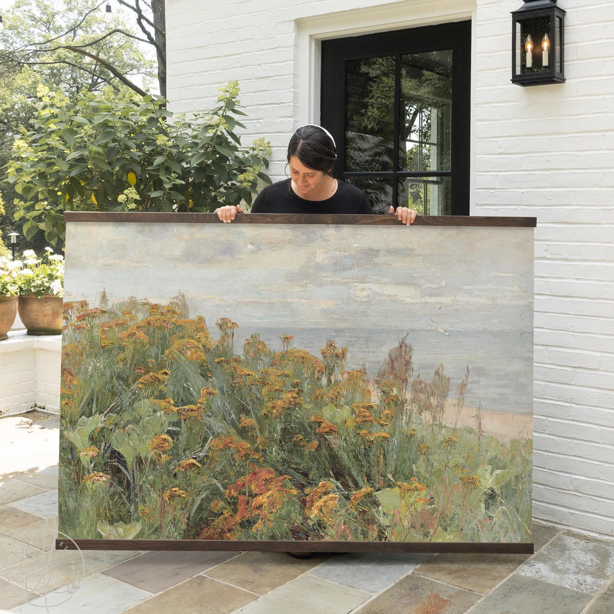 Large floral wall art canvas featuring wildflowers by the coast in soft vintage tones.