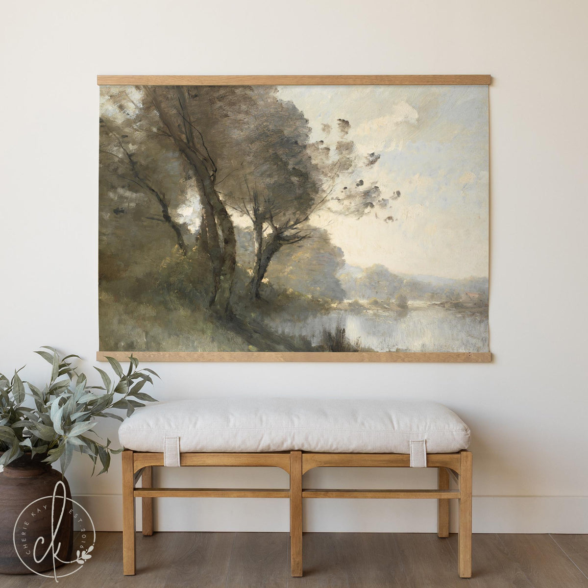 Large wall tapestry of tree landscape over river in soft neutral tones, canvas wall hanging with wooden frames.