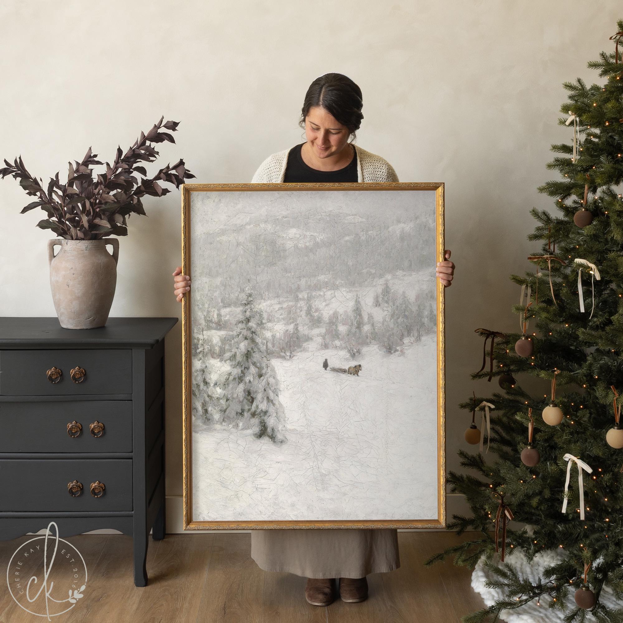 Framed vintage Christmas wall decor with horse and sleigh in snowy winter landscape.
