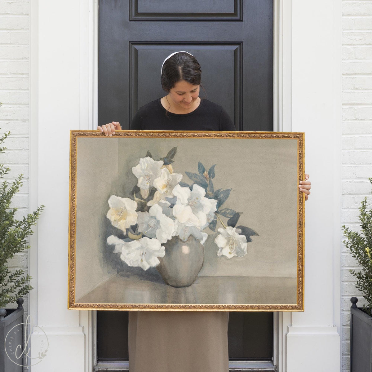 Vintage floral wall art with white flowers in gold frame, classic still life painting.