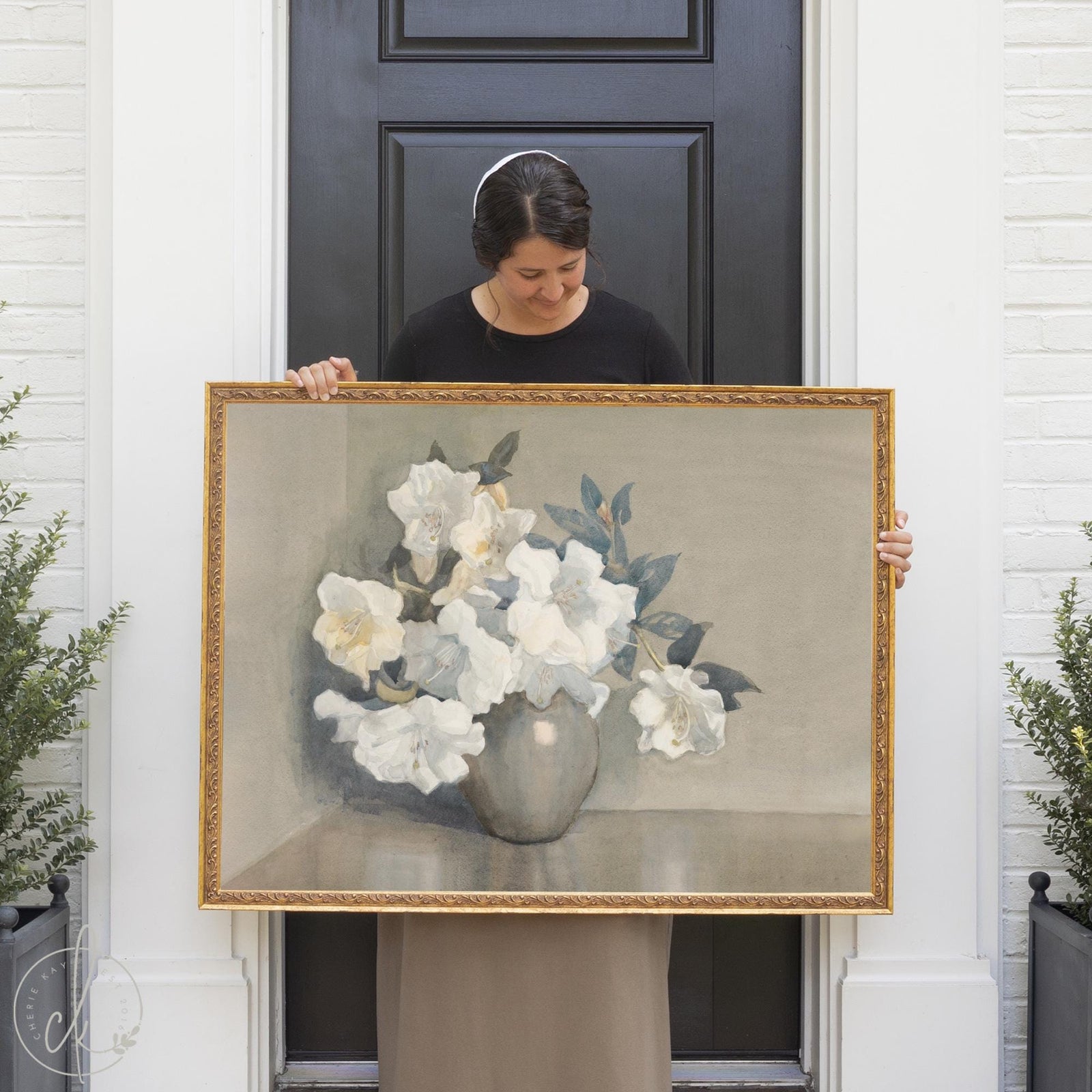 Vintage floral wall art with white flowers in gold frame, classic still life painting.