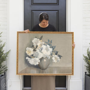 Vintage floral wall art with white flowers in gold frame, classic still life painting.