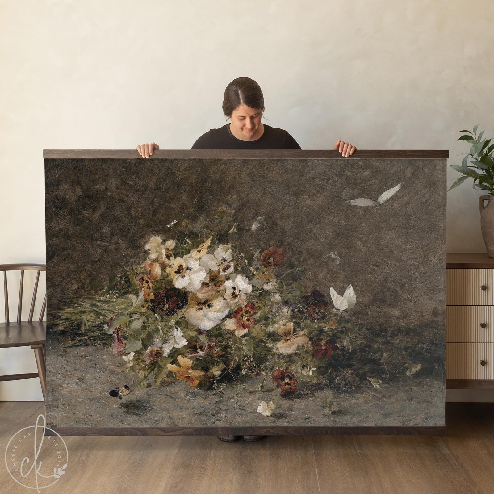 Floral canvas with wildflowers and butterflies in soft vintage tones.
