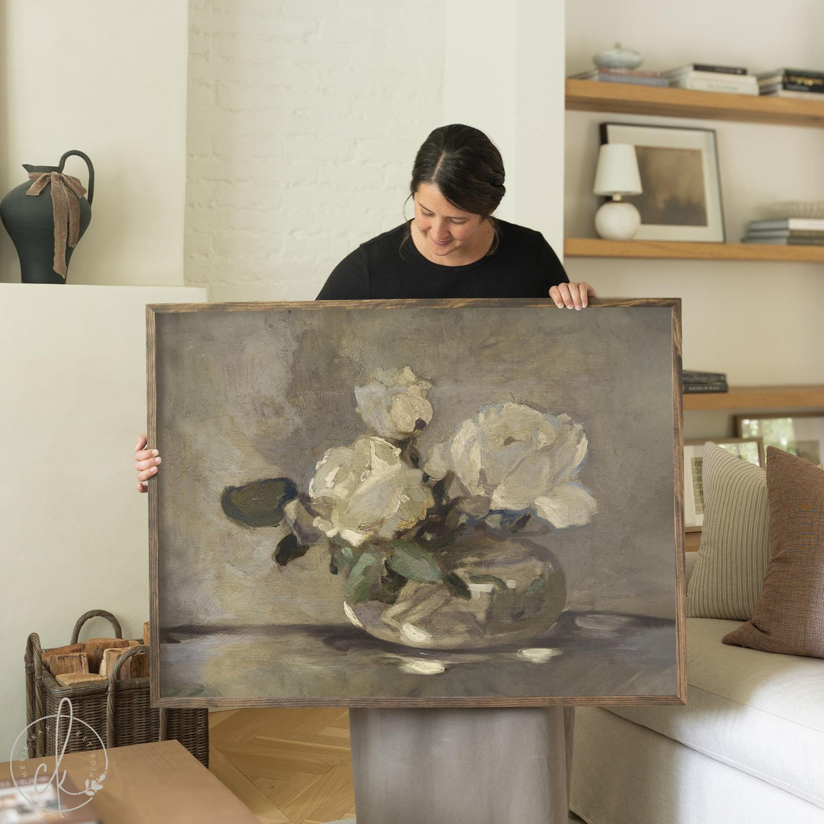 Framed canvas white flower wall art featuring white blooms in a glass vase on a neutral background.