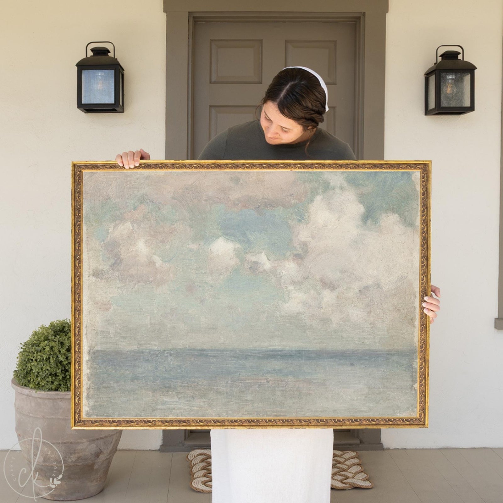 Vintage seascape framed coastal wall art with soft ocean horizon in muted tones.