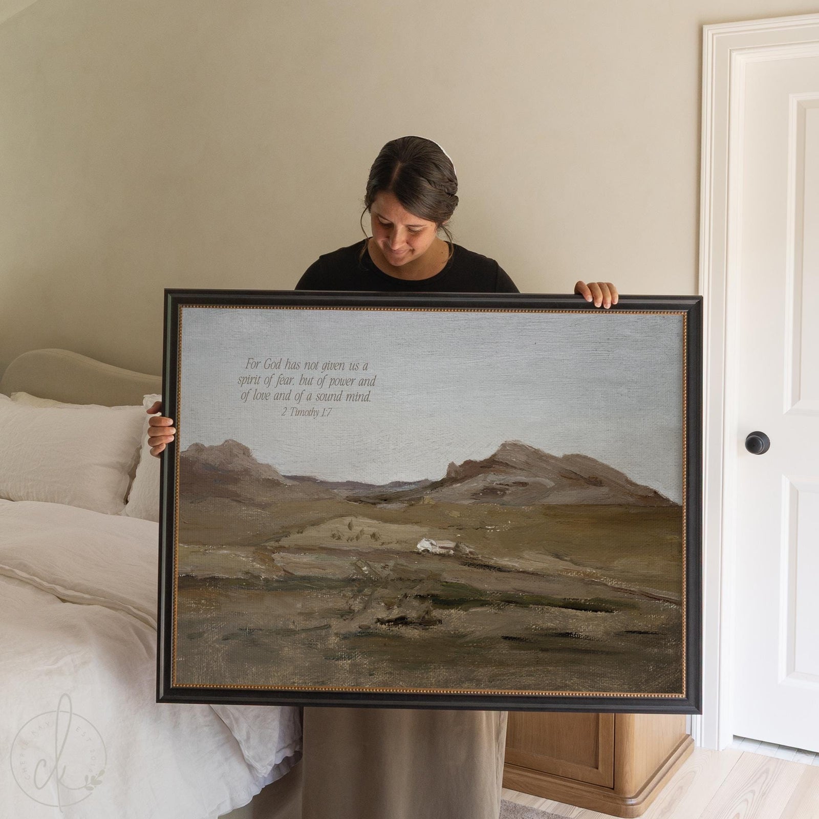 Large scripture wall art featuring a muted mountain landscape with 2 Timothy 1:7 in a black frame with gold bead liner