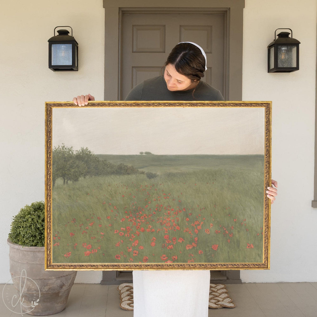 Large framed poppy field painting with gold frame and green meadow landscape wall art.