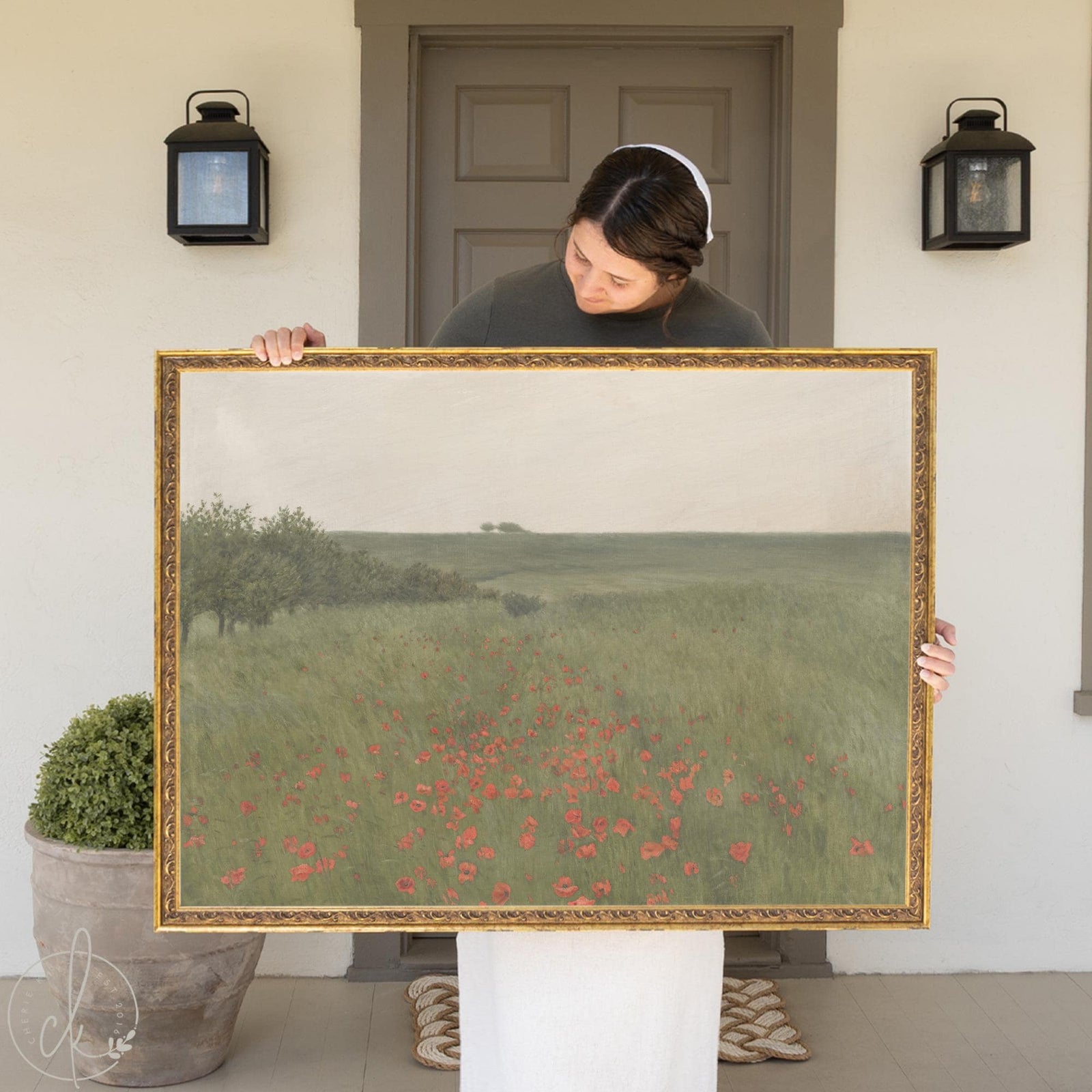 Large framed poppy field painting with gold frame and green meadow landscape wall art.