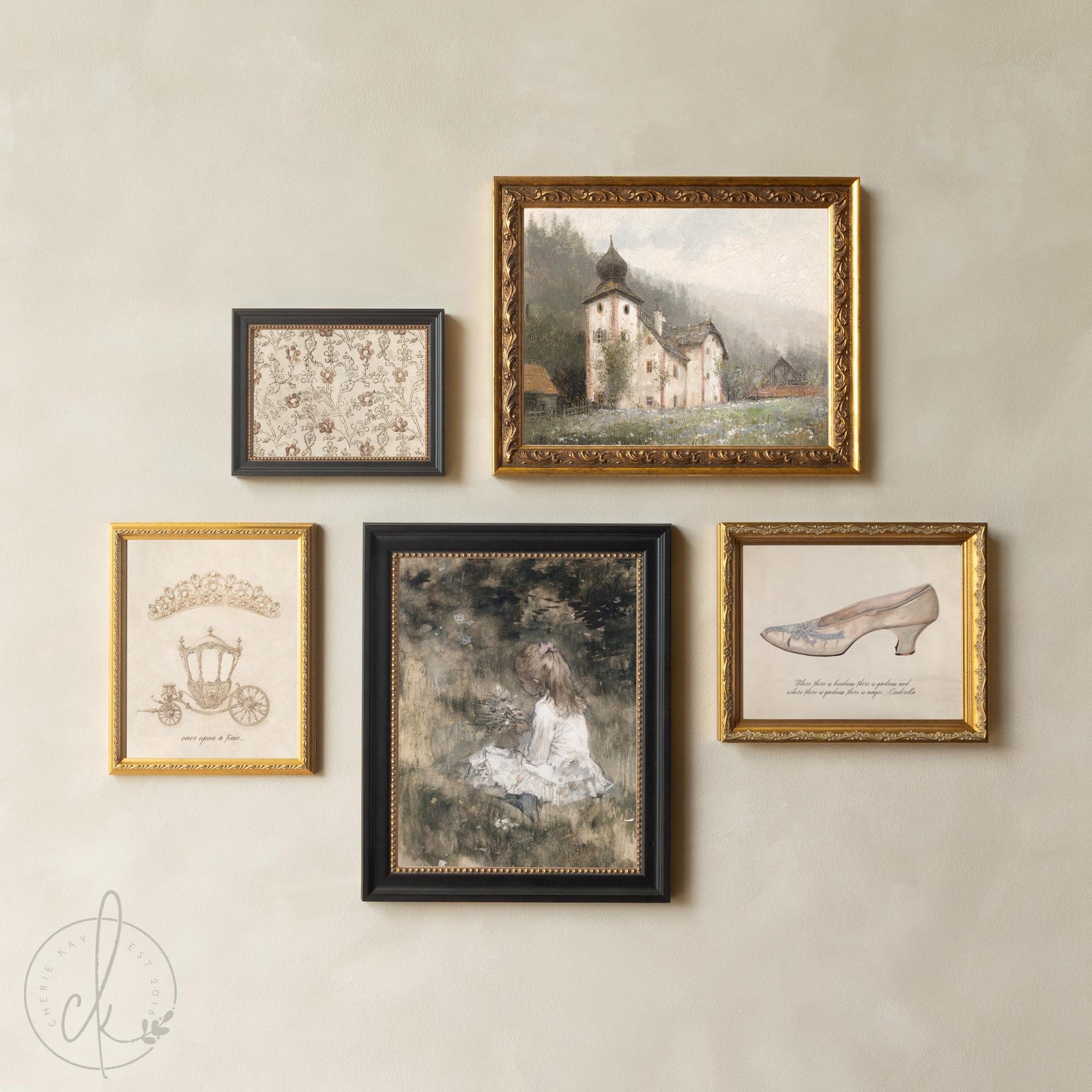 Vintage fairytale nursery princess decor with gold frames and Cinderella artwork.
