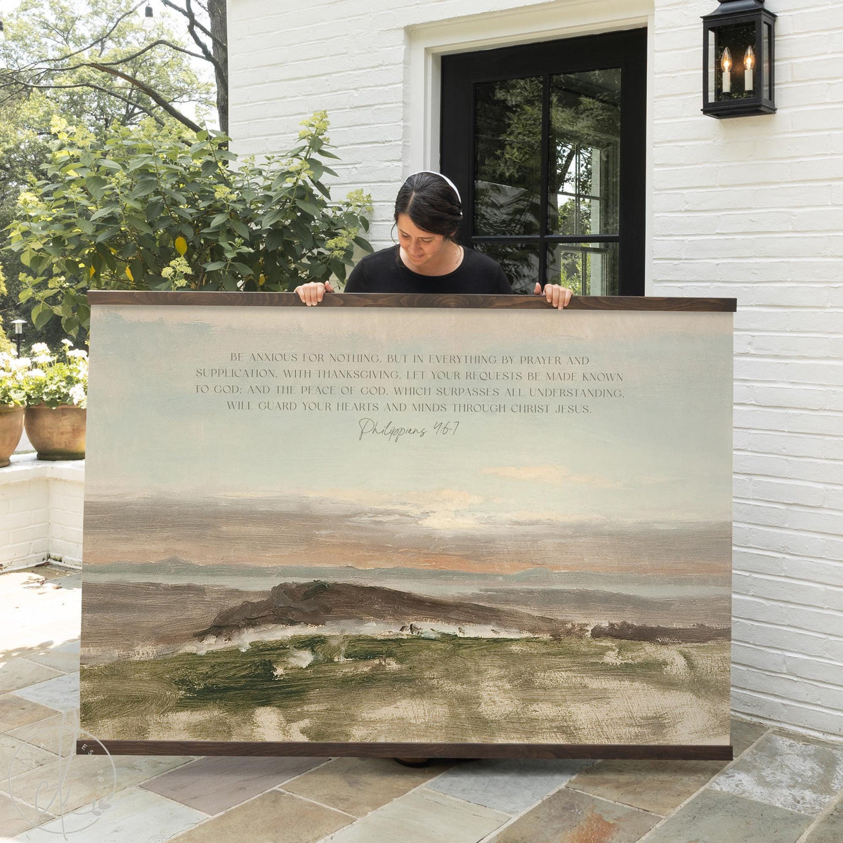 Bible verse canvas featuring Philippians 4:6-7 printed on a soft landscape painting.