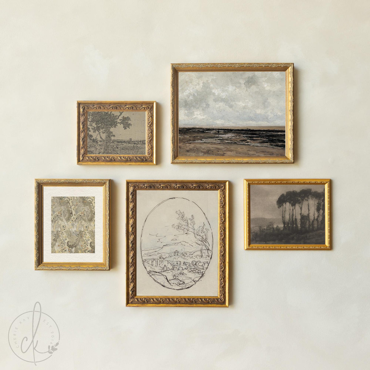 Vintage art prints in antique gold frames, framed gallery wall set with neutral landscapes.
