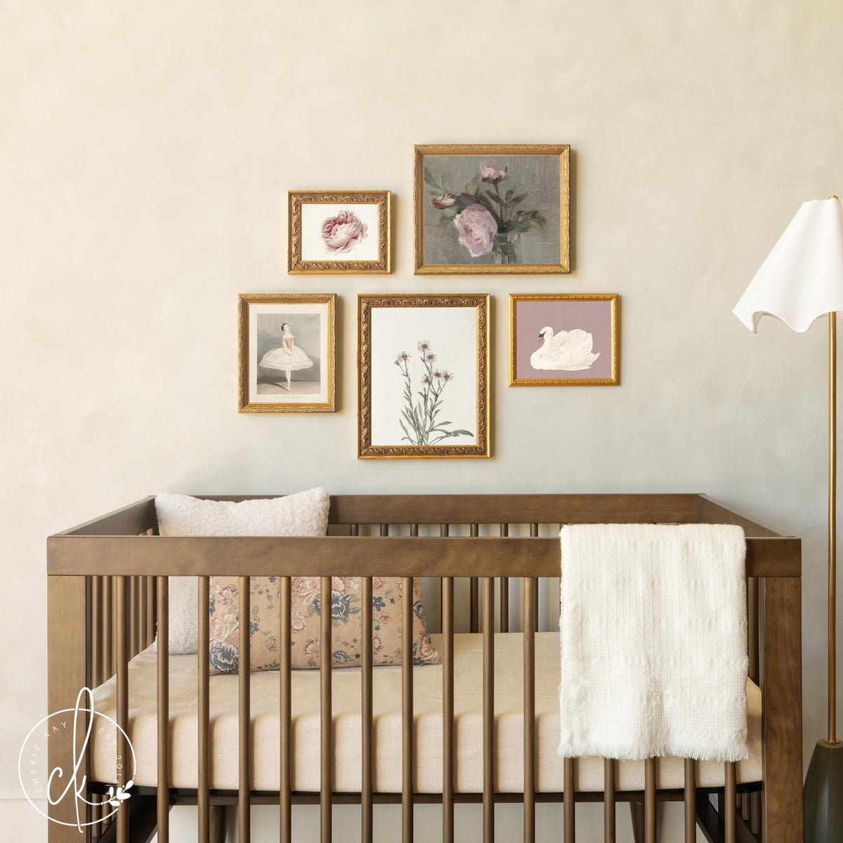 Vintage nursery wall art with botanical flowers, ballerina, and swan prints in gold frames
