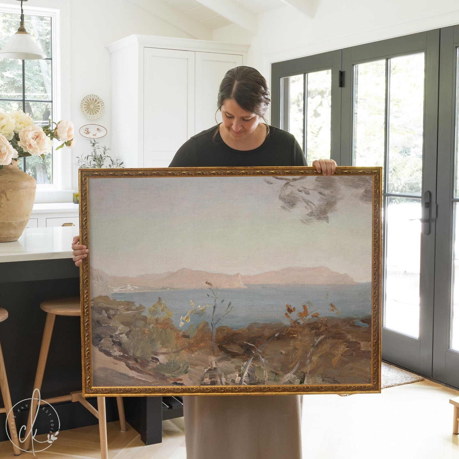 Vintage coastal wall art featuring Mediterranean seascape with rocky shoreline and distant mountains in ornate gold frame