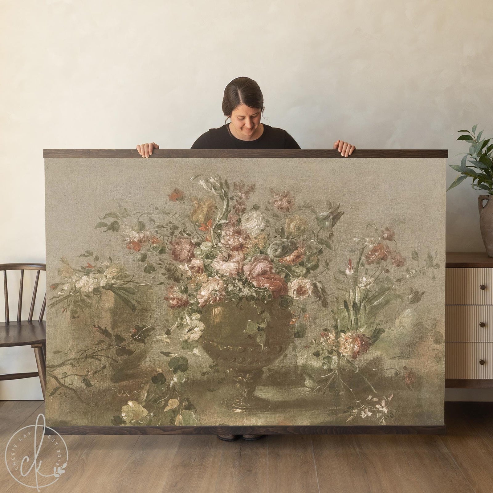 Vintage floral tapestry with a peony and rose bouquet in an ornate urn, finished with a natural wood frame.