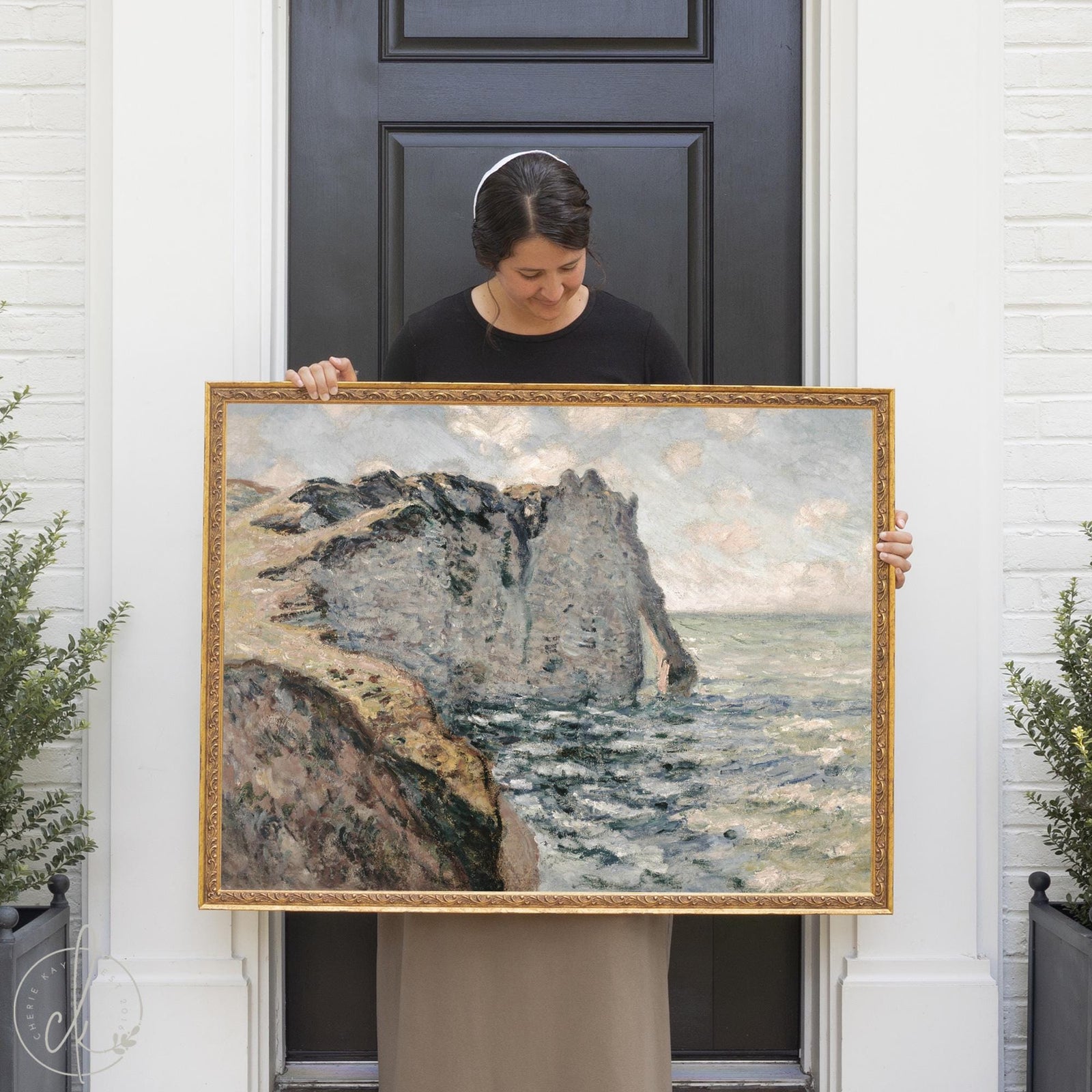 Monet ocean painting The Cliff of Aval Étretat framed canvas print with ornate gold frame.