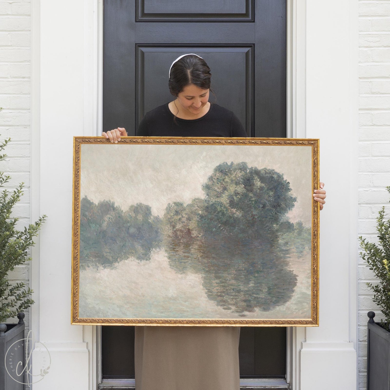 Monet canvas print of The Seine at Giverny in ornate gold frame showing misty river and green trees.