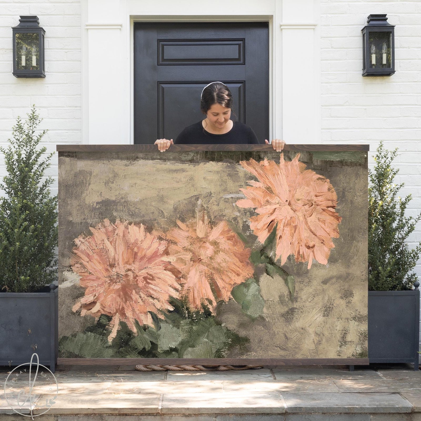 Chrysanthemum wall art with peach and coral blooms painted on a canvas banner with a natural wood frame.