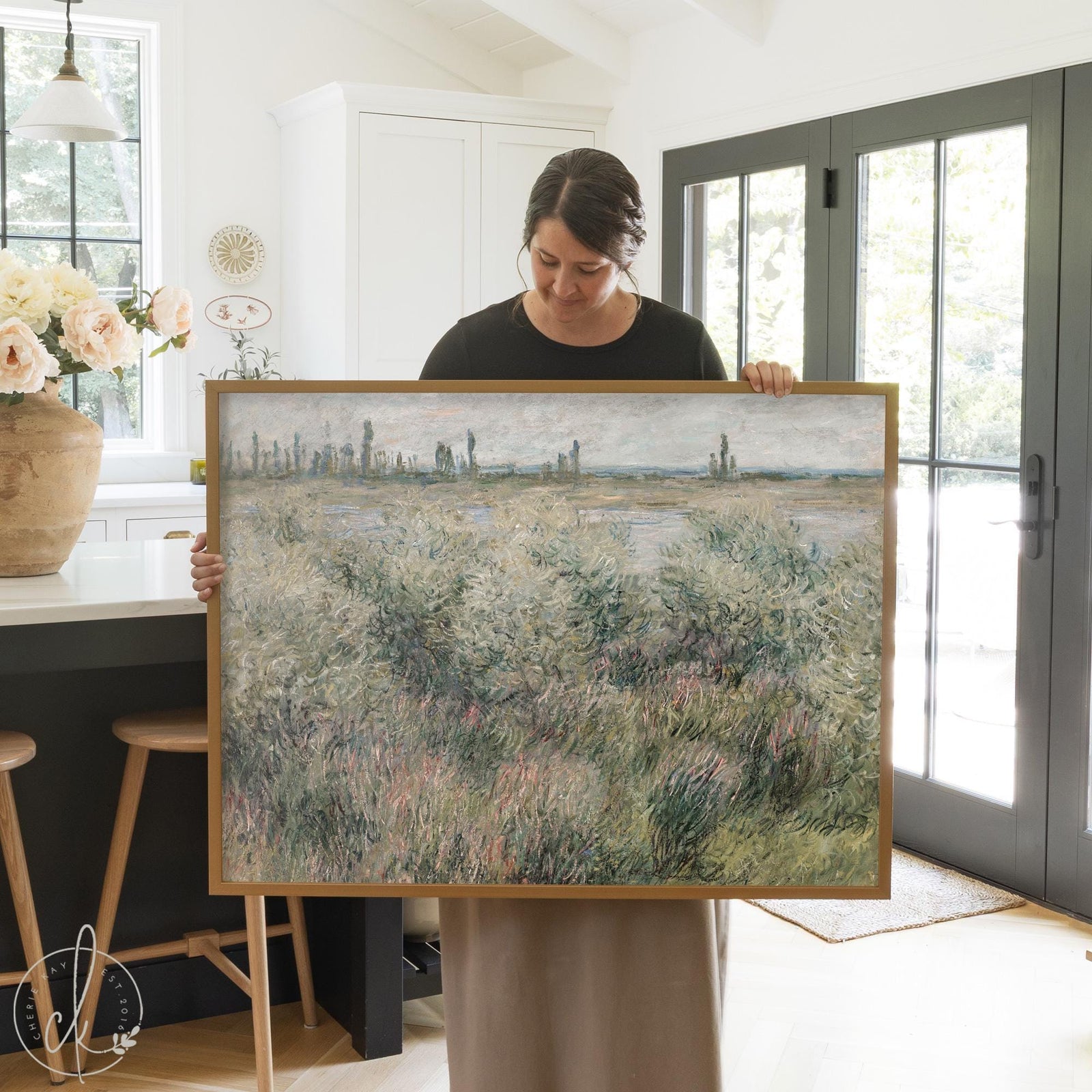 Framed landscape art print of Claude Monet Banks of the Seine Vétheuil meadow scene in a gold frame