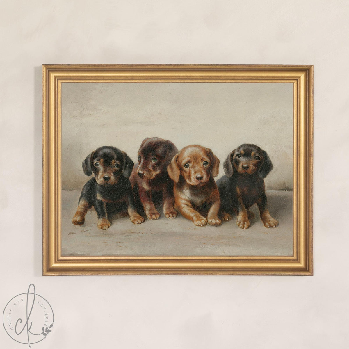 Framed canvas of four dachshund puppies with a classic painted look in a vintage gold frame, puppy nursery decor