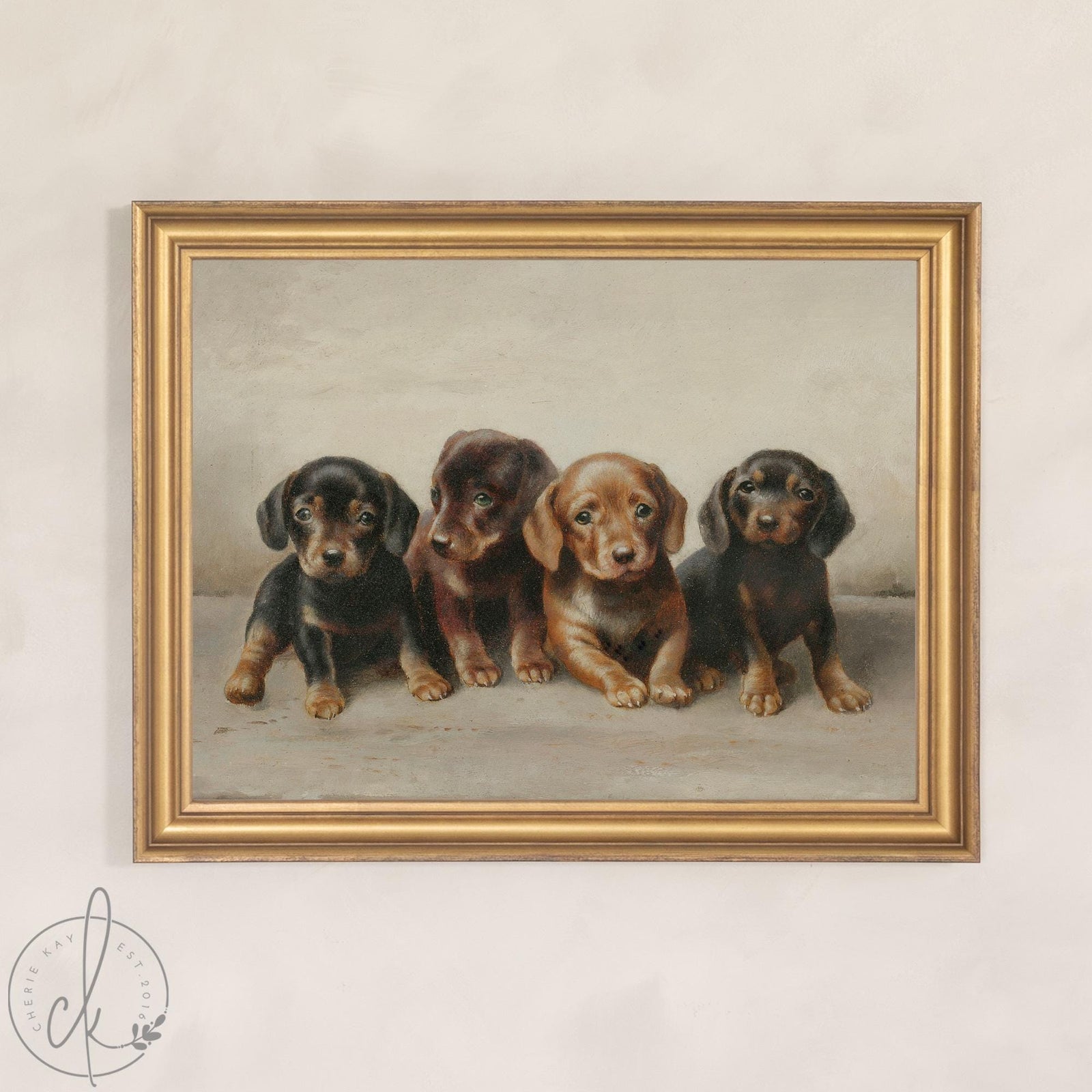 Framed canvas of four dachshund puppies with a classic painted look in a vintage gold frame, puppy nursery decor