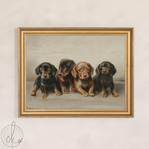 Framed canvas of four dachshund puppies with a classic painted look in a vintage gold frame, puppy nursery decor