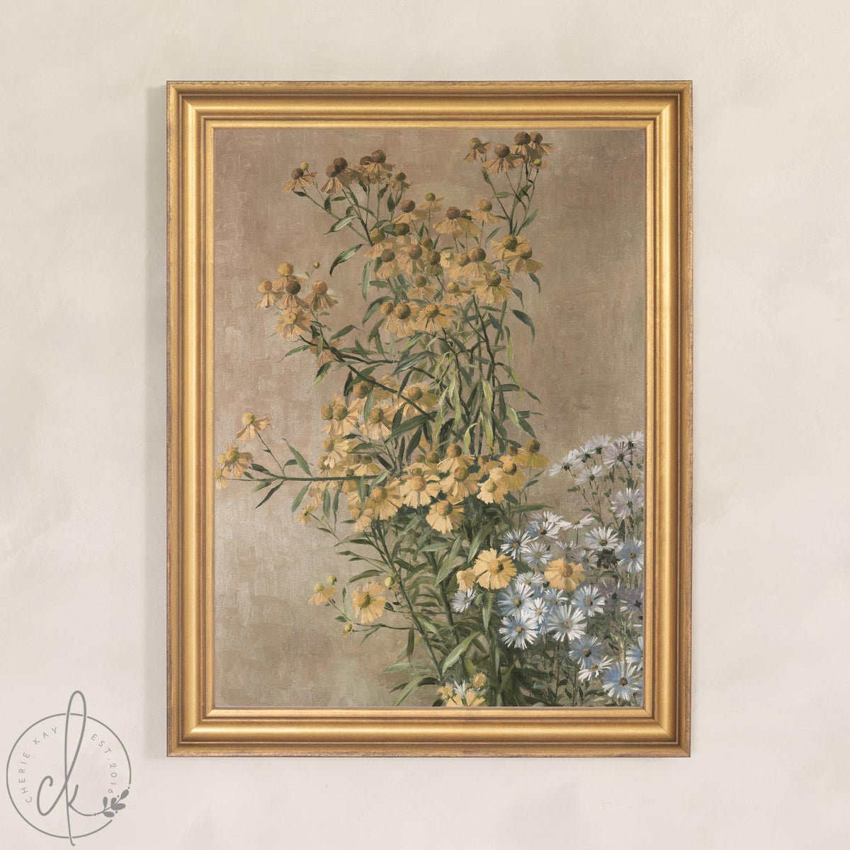 Vintage botanical print of golden yellow daisies and white asters in a chunky gold wood frame on a soft beige wall.