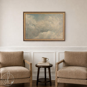 Vintage cloud painting with soft sunlit clouds on a muted blue sky in a gold frame