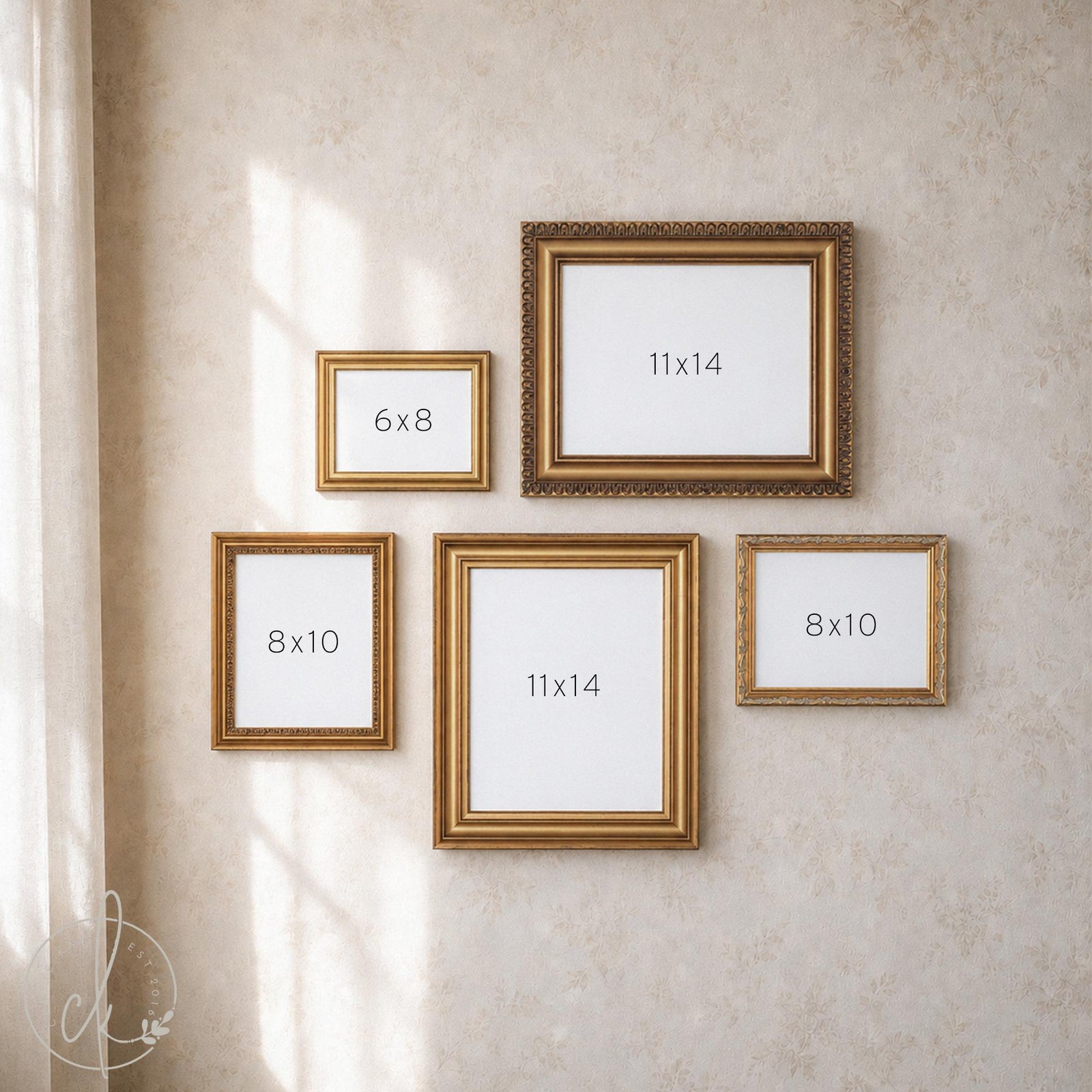 Vintage gold gallery wall frame set of five empty ornate and classic frames in 6x8, 8x10, and 11x14 sizes on a floral wall