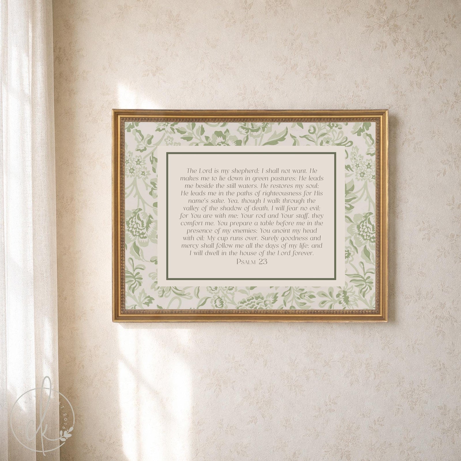 Psalm 23 prayer artwork with a green William Morris style floral border and gold frame hanging on a cream wall