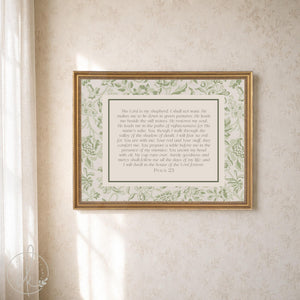 Psalm 23 prayer artwork with a green William Morris style floral border and gold frame hanging on a cream wall