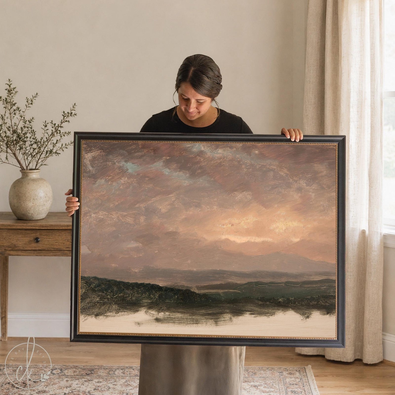 Evening sky painting framed canvas with rose and gold sunset over dark green hills in an vintage black frame