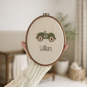 Car nursery decor name hoops with embroidered vintage race cars in navy and olive green on plain and striped cream fabric