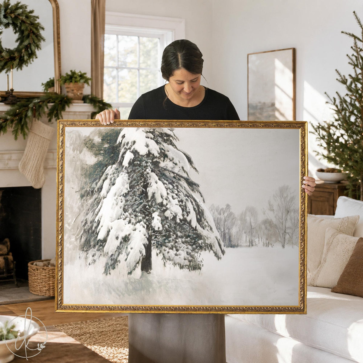 Christmas decor for wall: snow covered evergreen painting in an ornate gold frame, held up in a living room