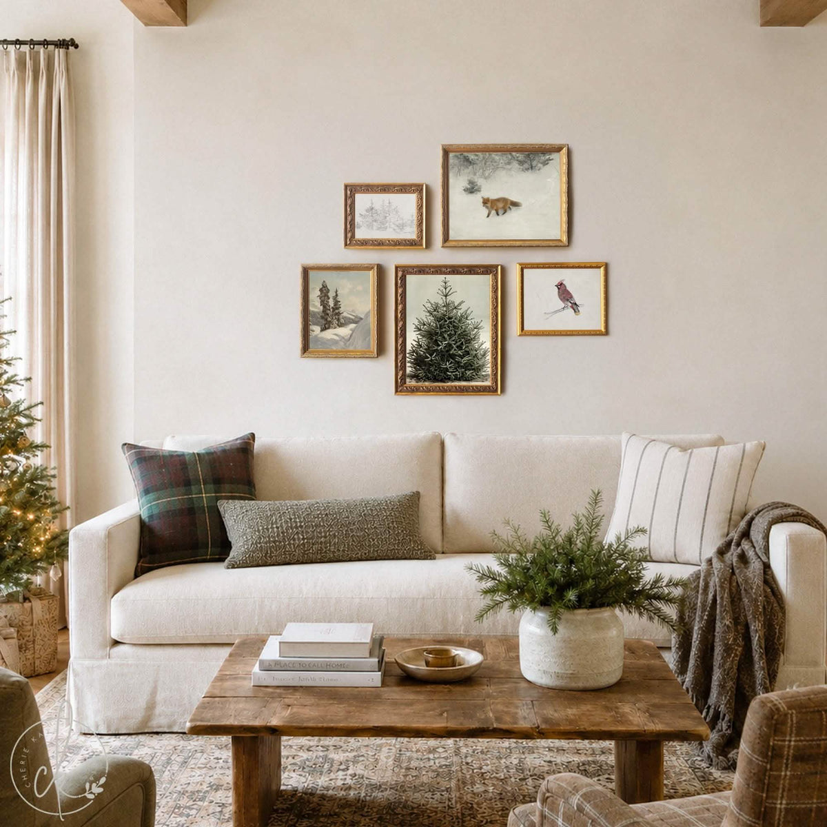 Christmas art for wall set of 5 in ornate gold frames: fox, evergreens and waxwing above a cream sofa in a living room